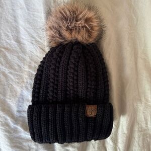 Winter beanie with fur ball